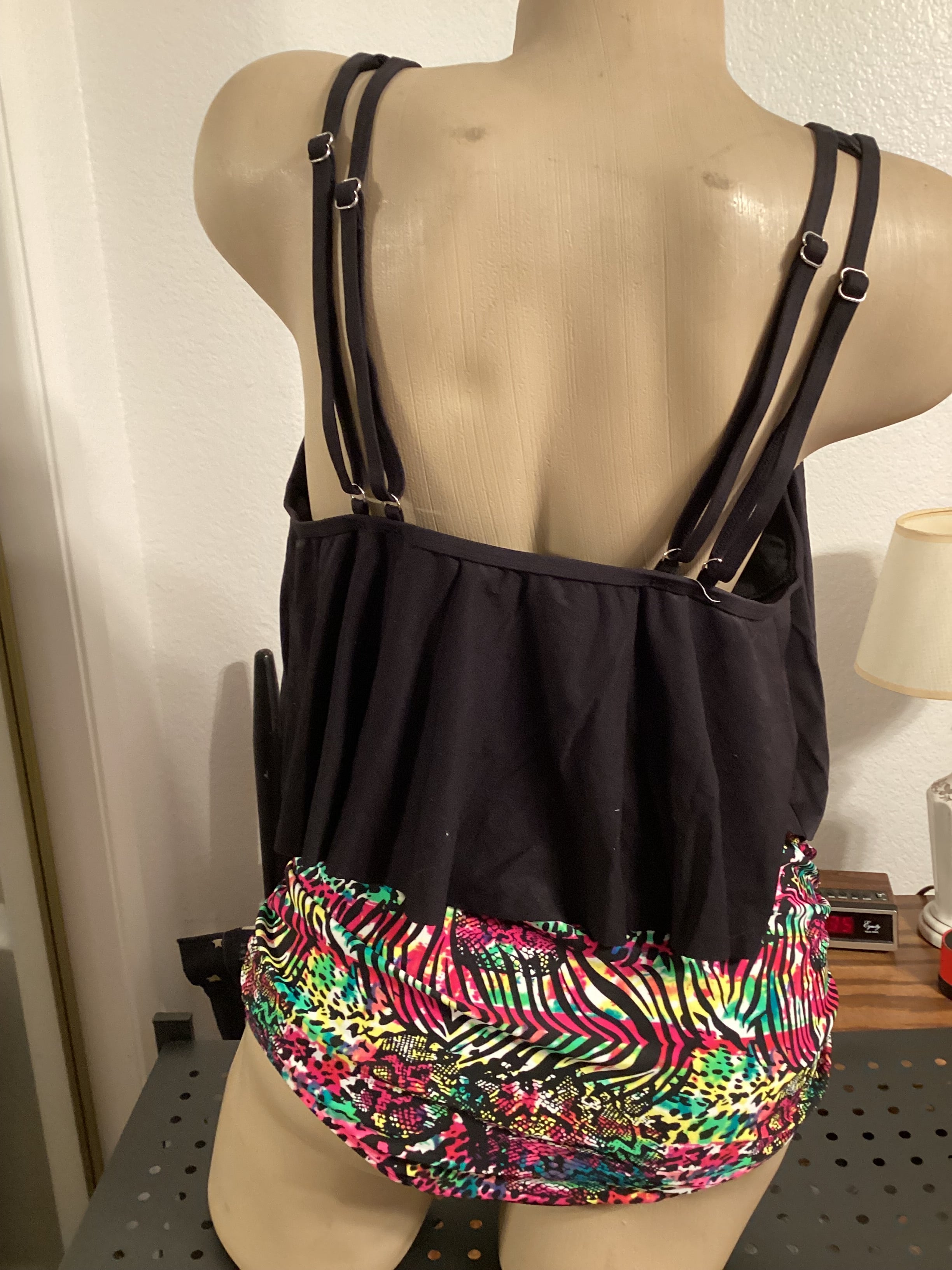 2 piece tankini swimsuit multicolored full coverage bottom with black top. Sizes s,m,l