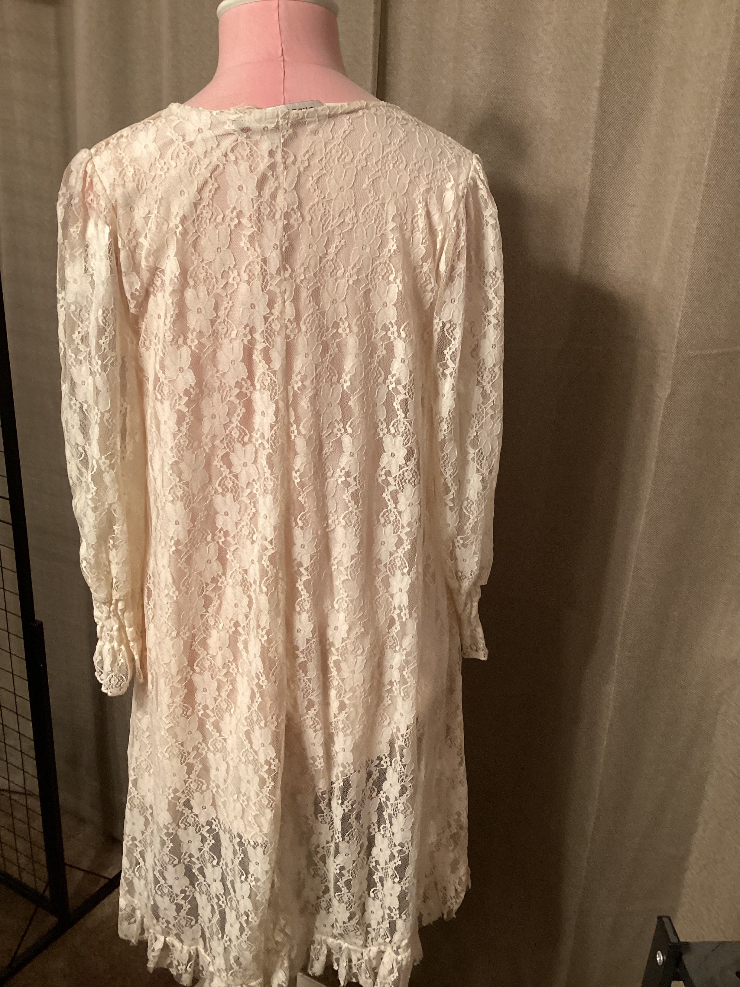 Origami white lace dress with soft lining. Size small.