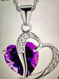 Beautiful heart necklace with Purple Heart stone in middle