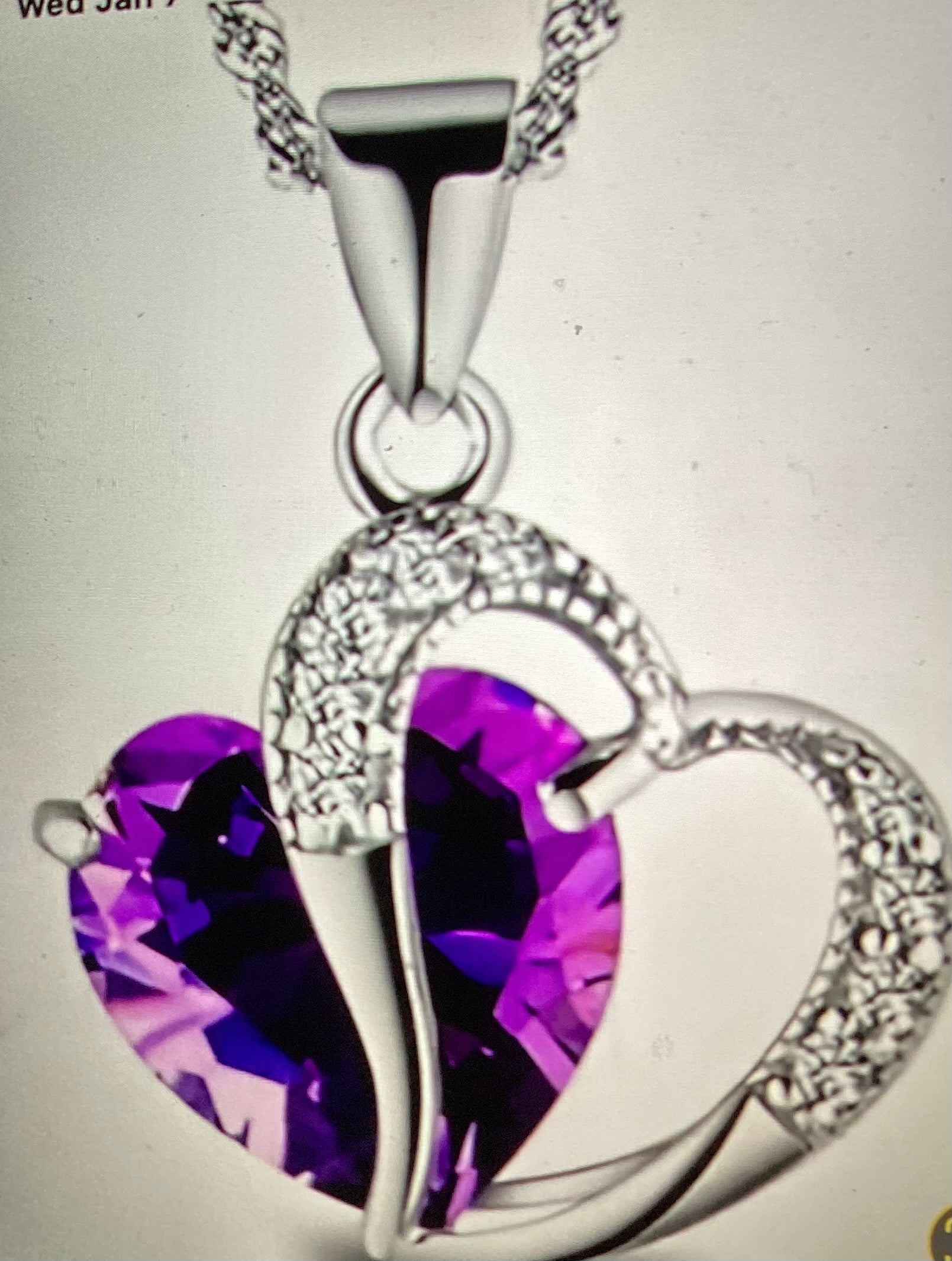 Beautiful heart necklace with Purple Heart stone in middle