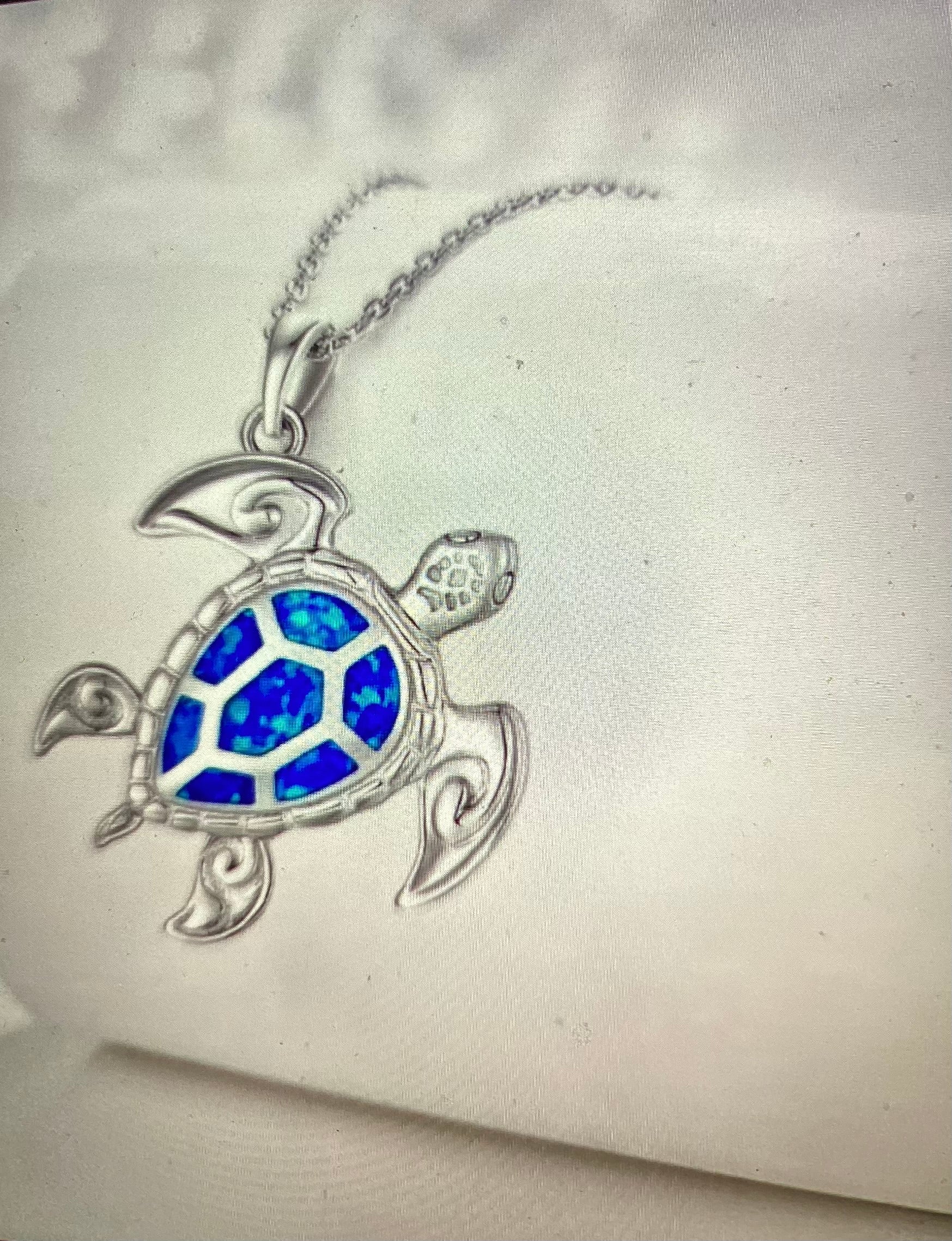 Sea turtle with beautiful blue stones on his shell