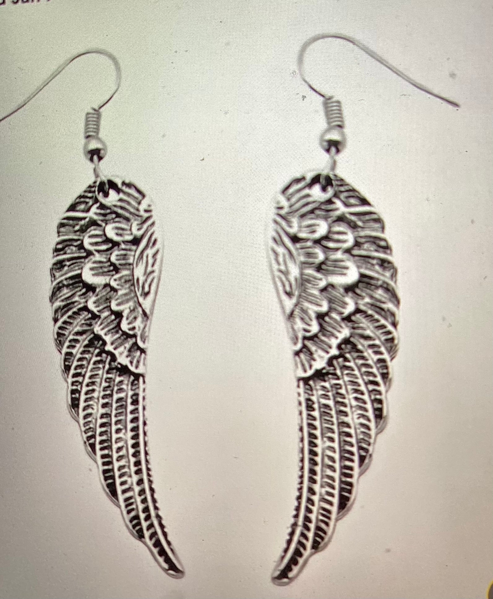 Angle wing dangling earrings