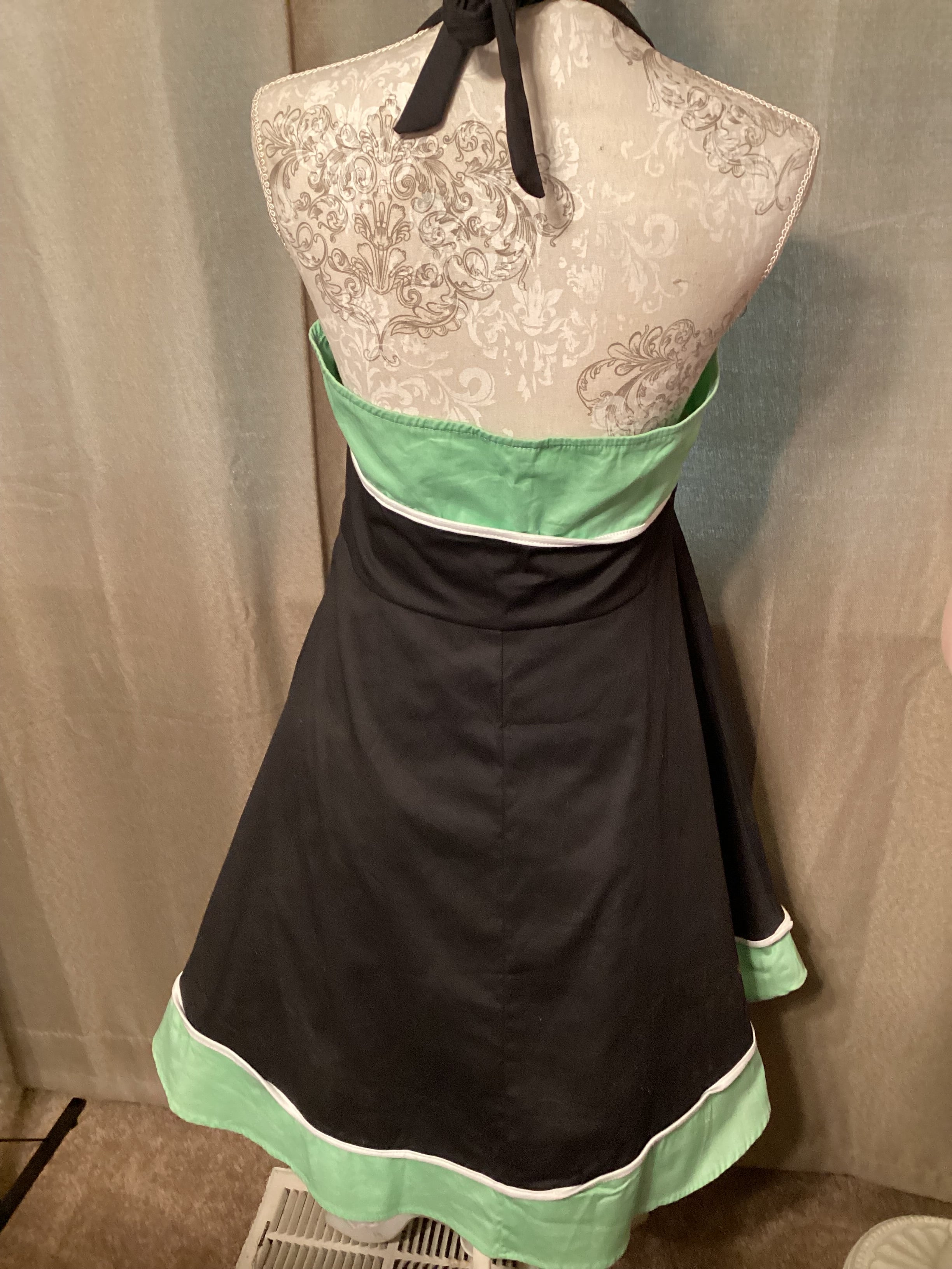 50’s style halter black and green dress with low cut back