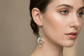 Silver Dangle Music Knots Earrings