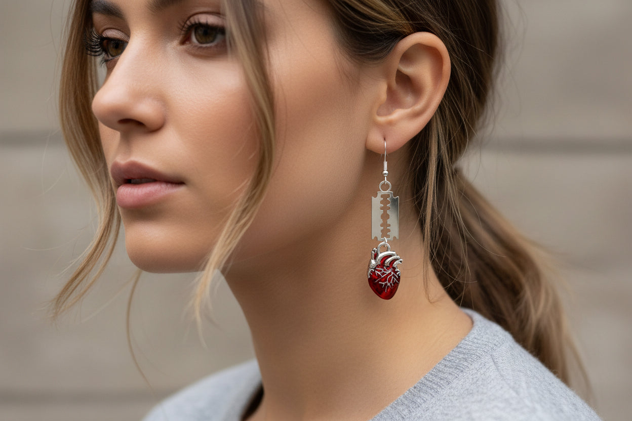 Dangle Earrings with Red Beating Hearts and Razor Blades